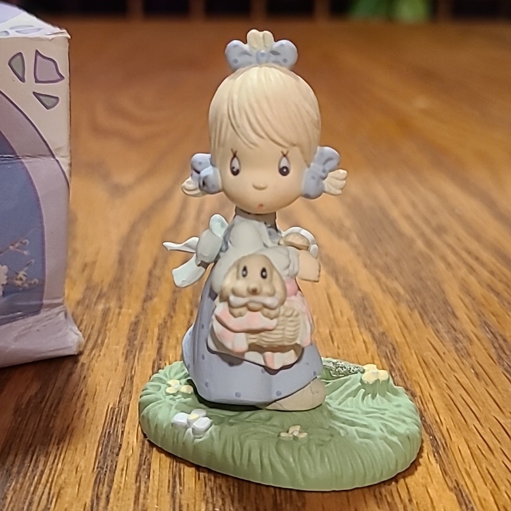 Precious Moments July Figurine